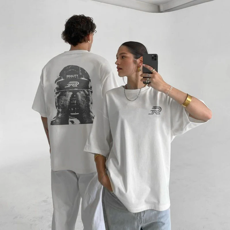 Reality Racing - Two people wearing oversized Reality Racing tees
